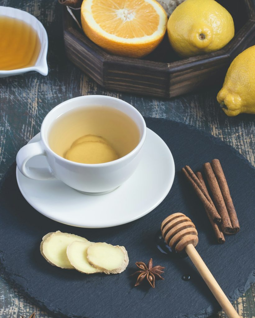 Ginger hot immunity boosting Vitamin natural drink With citrus, honey and cinnamon and ingredients